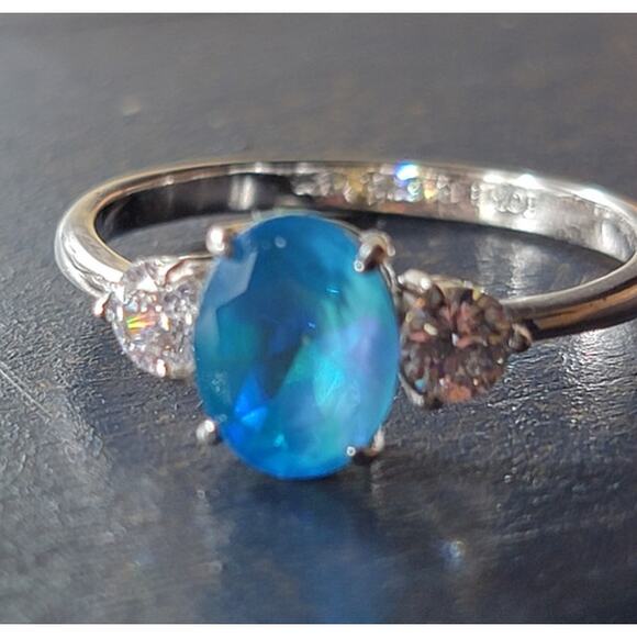 Stunning Rhodium-Plated Size 10.5 Ring with Blue Gemstone and Diamond Accents - Picture 1 of 12